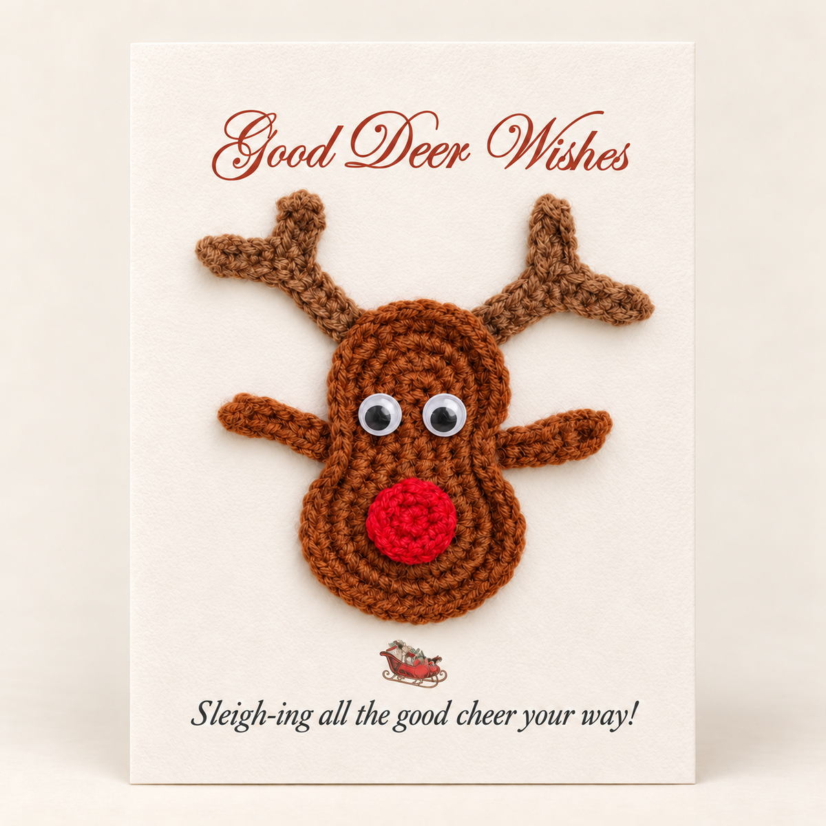 Handmade crochet reindeer Christmas greeting card on cream cardstock
