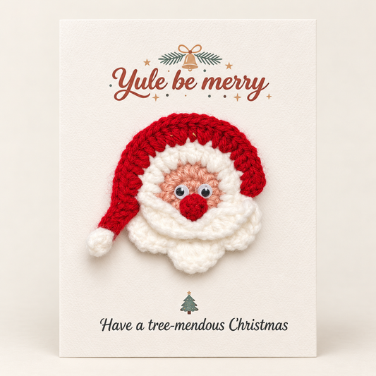 Handmade crochet santa Christmas greeting card on cream cardstock